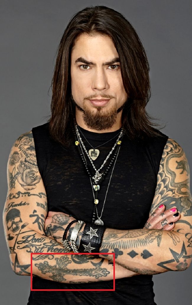 Dave Navarro Celtic cross and card-suit forearm tattoos