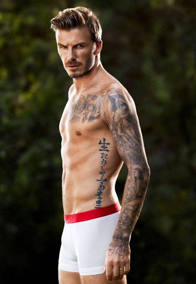 David Beckham Chinese-character rib tattoo shown clearly