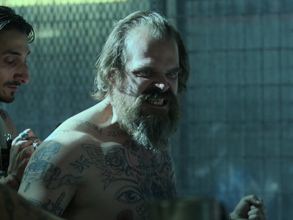David Harbour Red Guardian prison tattoos and Melina neck portrait