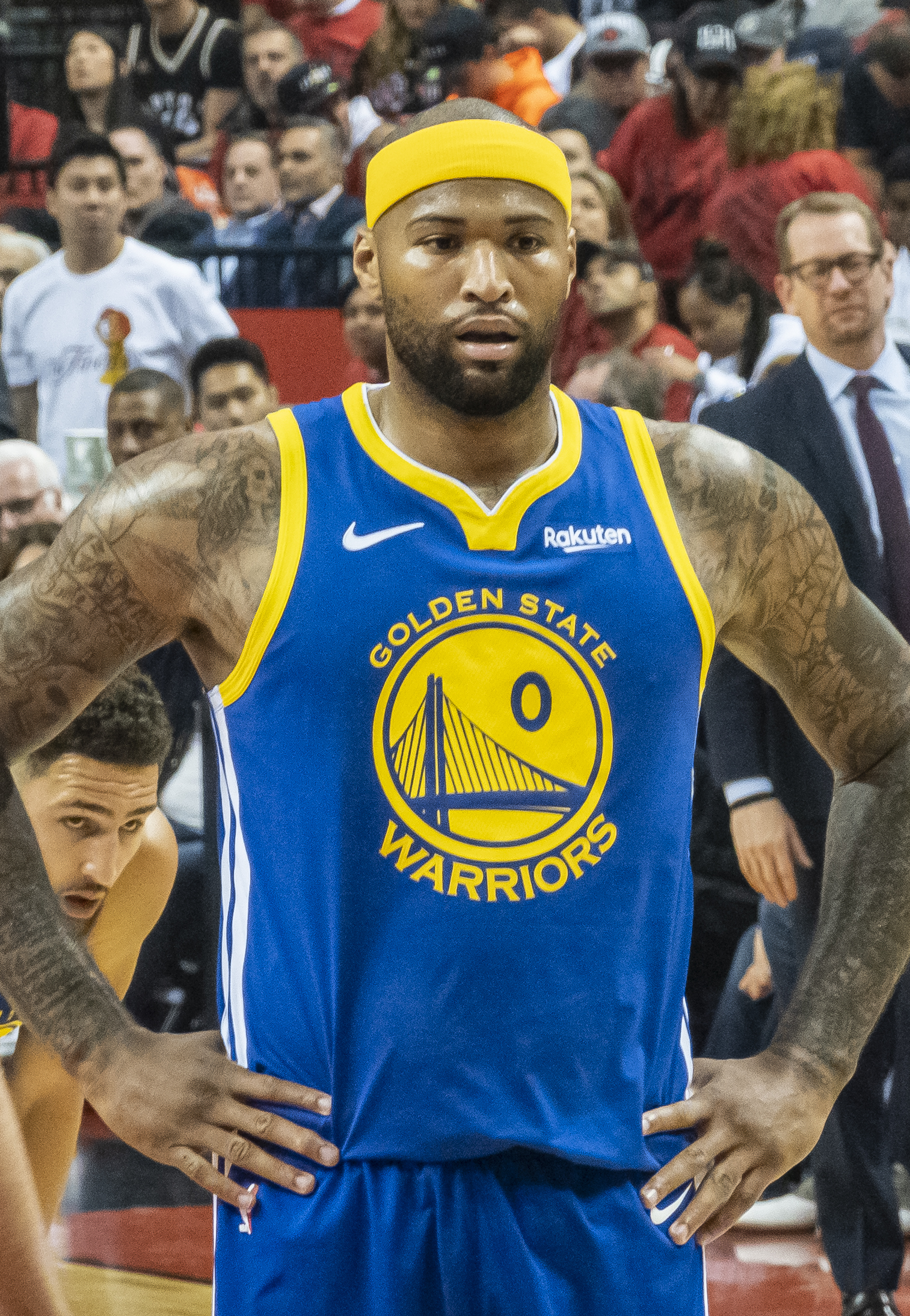 DeMarcus Cousins showing the mother portrait tattoo tattoo area