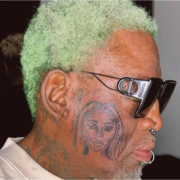 Dennis Rodman cheek portrait tattoo of Yella Yella