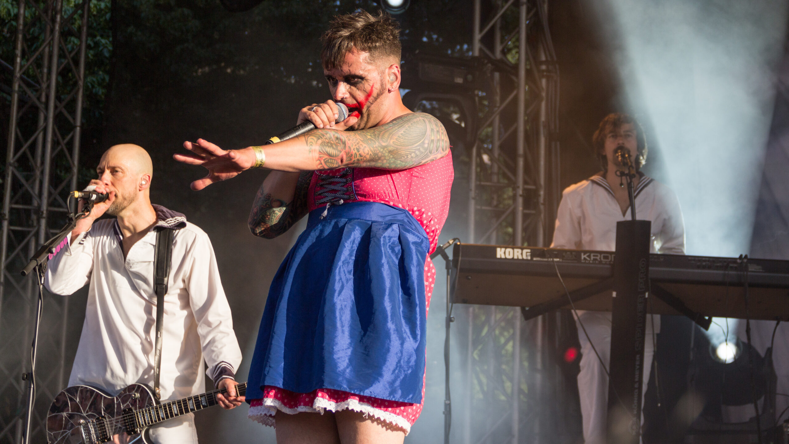 Dero Goi full arm tattoo project shown during a live performance.