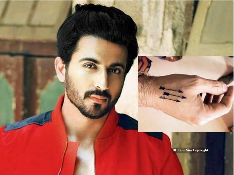 Dheeraj Dhoopar opposite arrows tattoo on the hand
