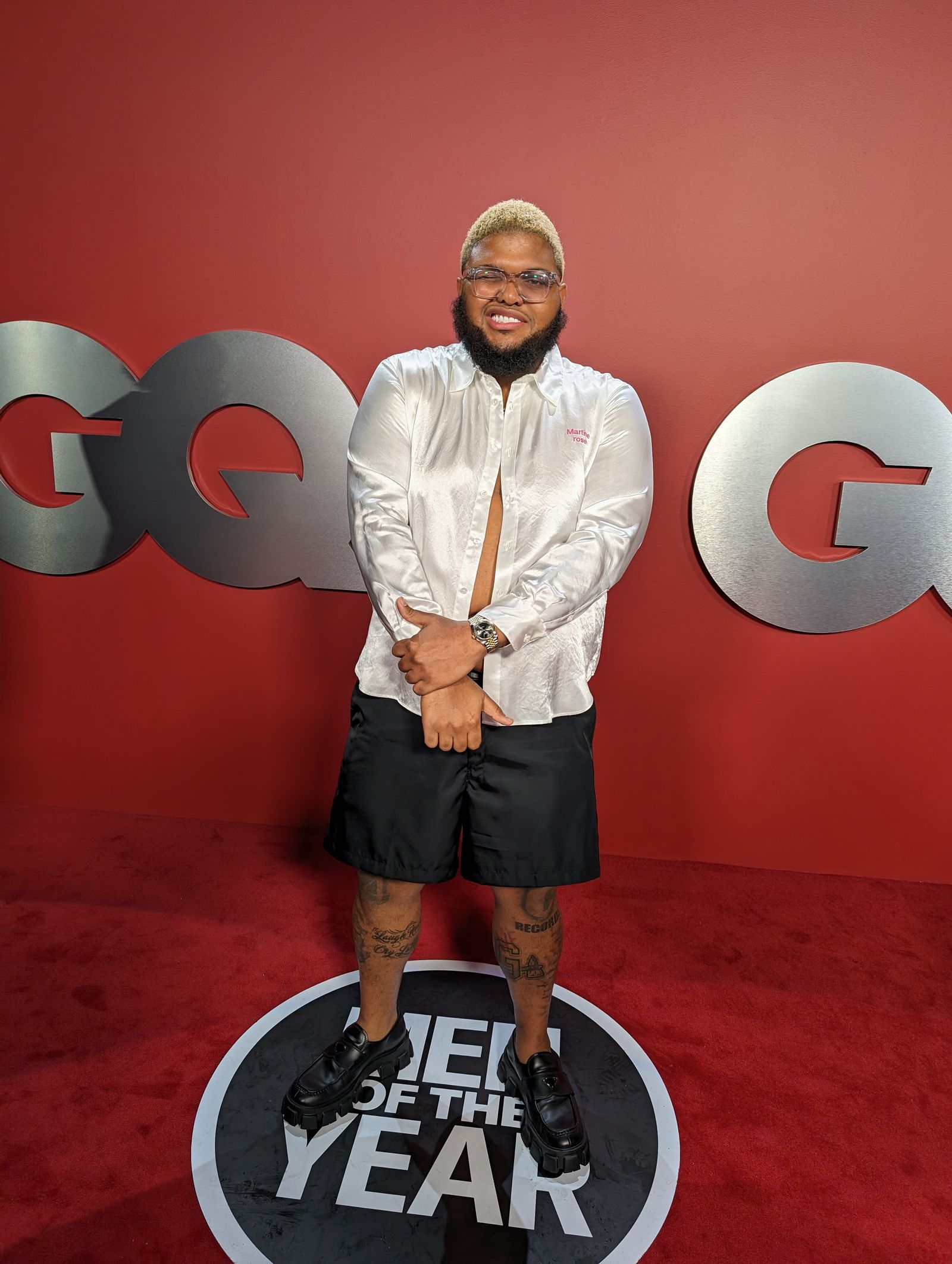 Druski leg tattoos in a GQ portrait
