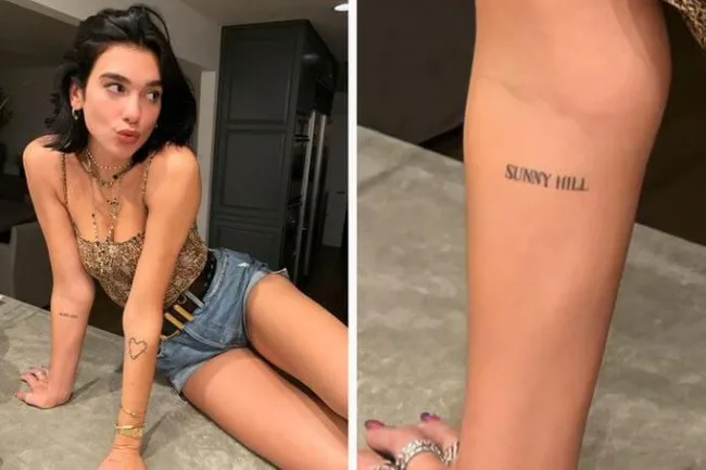 Dua Lipa’s Sunny Hill tattoo on her inner arm