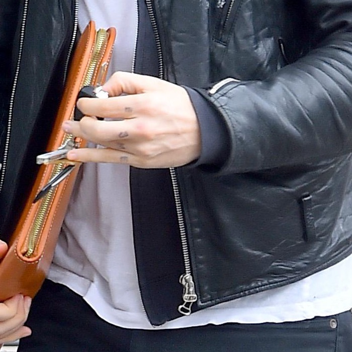 Ryan Gosling’s hand with the letters Esme written across his fingers in 2015