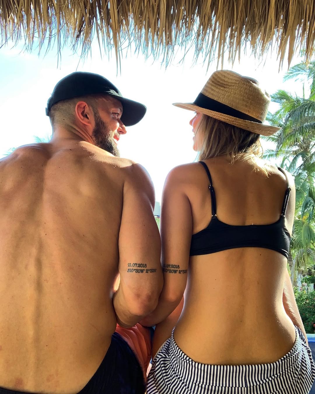 Finn Bálor and Vero Rodríguez show matching date and coordinate tattoos on their arms