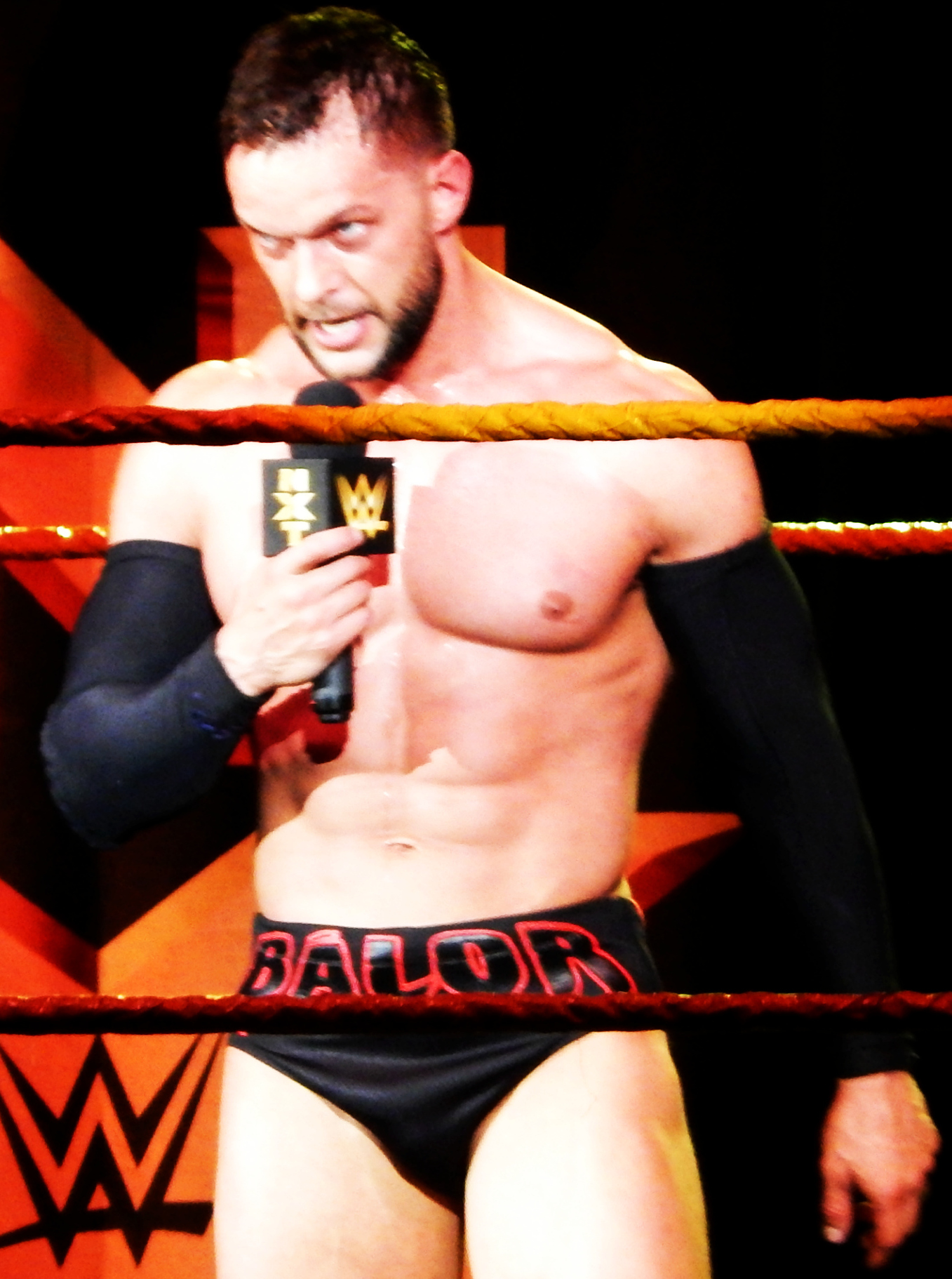 Finn Bálor’s astronaut and moon tattoo on the hand