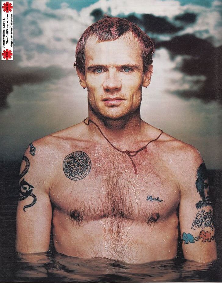 Flea’s Celtic-style chest spiral and elephant tattoos on his arm