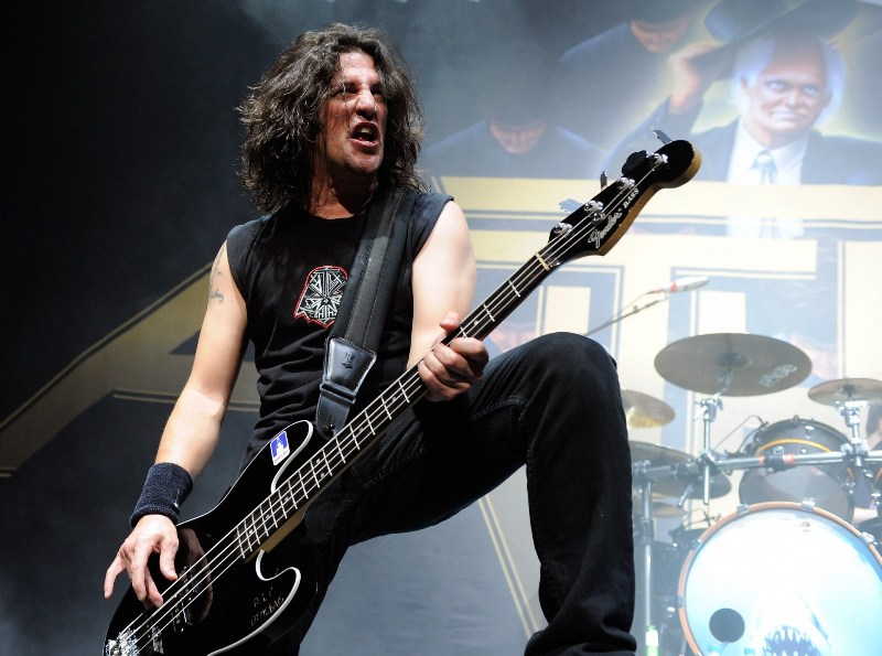 Frank Bello tattoo on arm during live performance