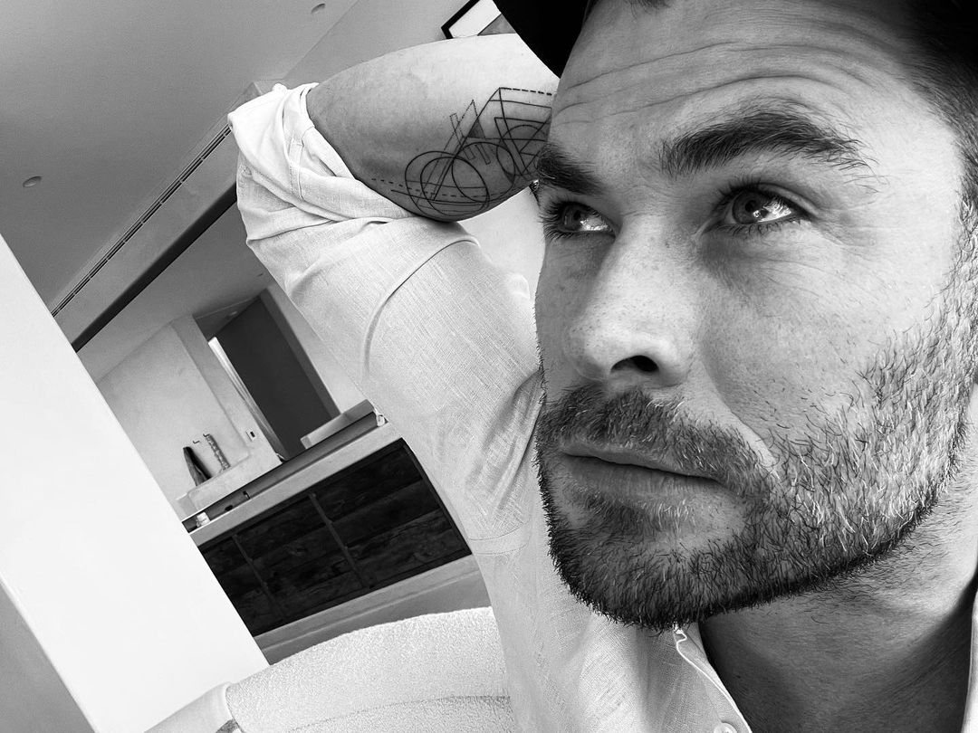 Close view of Chris Hemsworth’s completed sacred geometry forearm tattoo