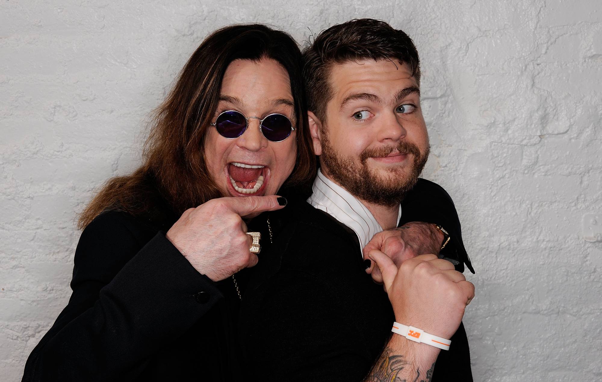 Jack Osbourne tattooed forearm in a family photo