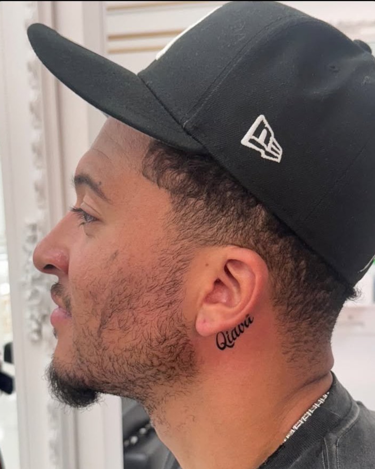 Jadon Sancho Saweetie tattoo behind his ear