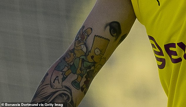 Jadon Sancho Simpsons tattoo arm close-up