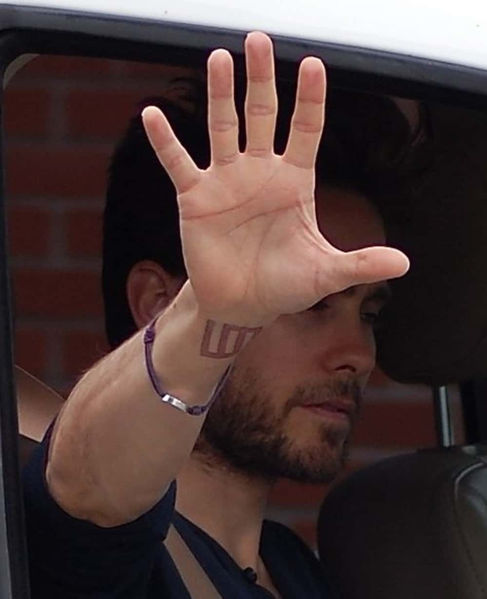 Jared Leto Thirty Seconds to Mars glyph wrist tattoo