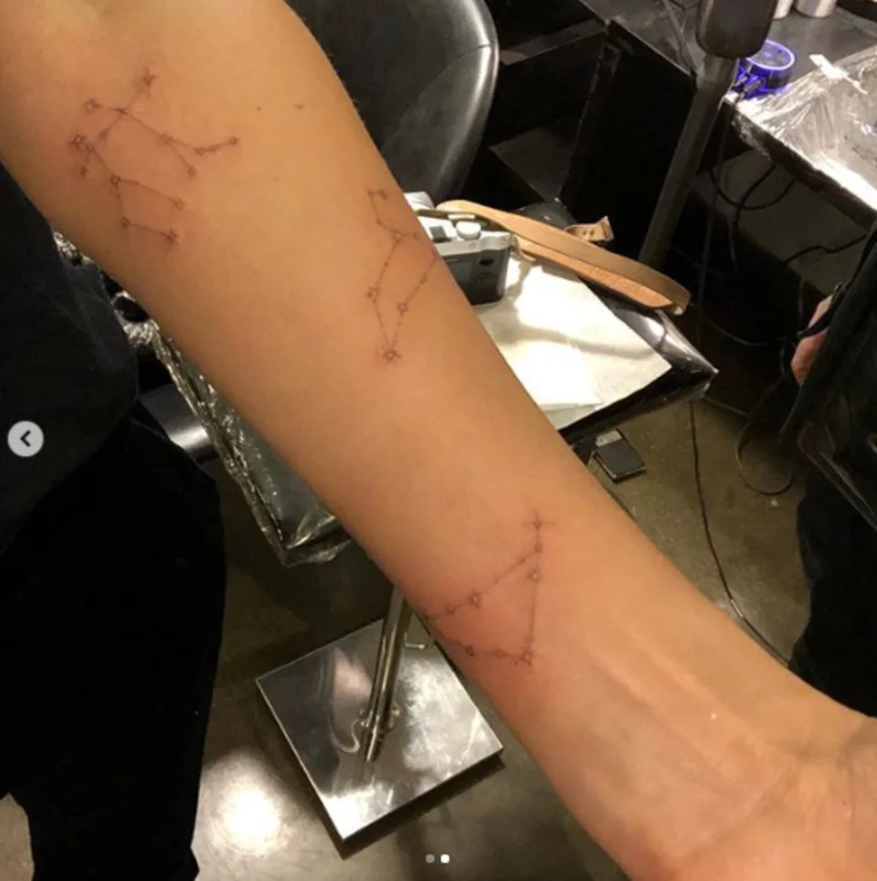 Jessica Alba three zodiac constellation tattoos on her forearm