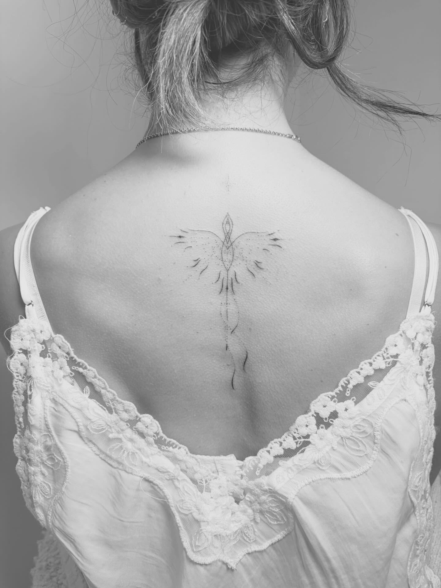 Jessica Alba phoenix tattoo on her back