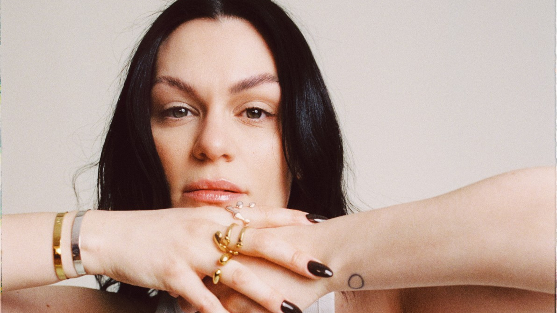Jessie J matching circle wrist tattoo