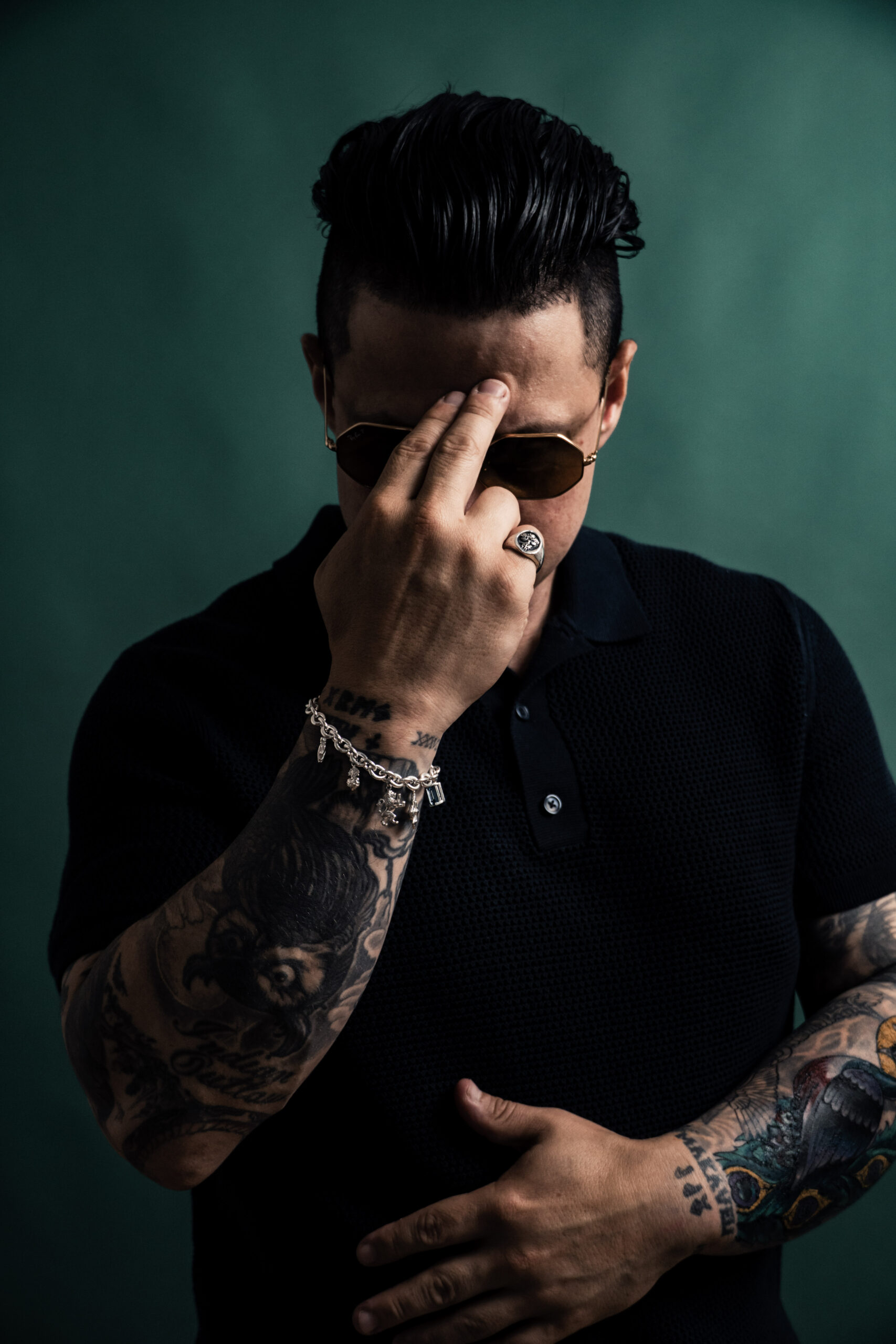 Joey Stylez detailed forearm tattoos