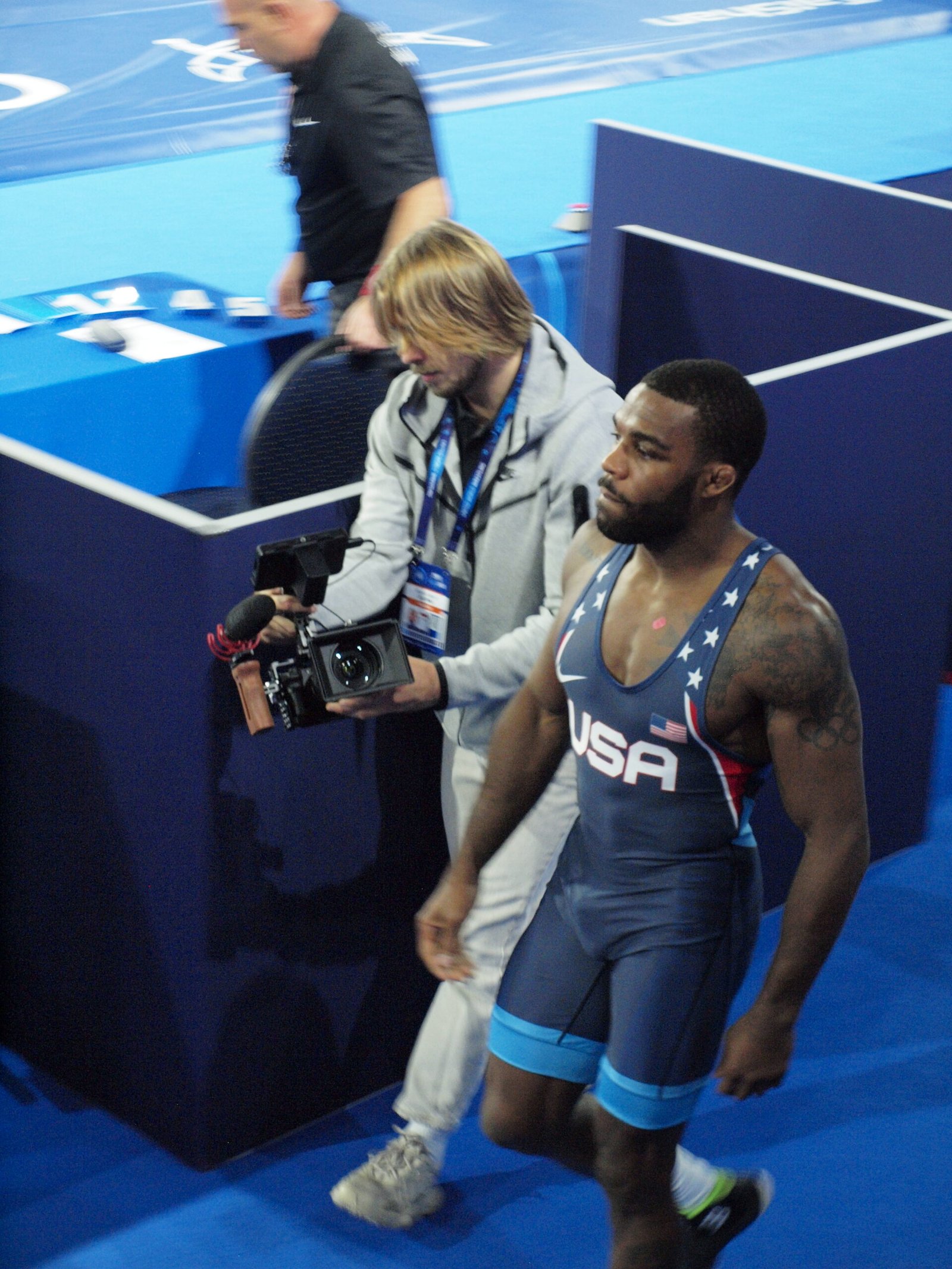 Jordan Burroughs JB initials and wings back tattoo