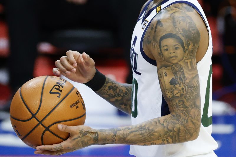 Jordan Clarkson showing the Allen Iverson portrait tattoo area