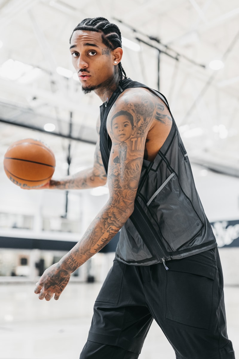 Jordan Clarkson showing the sleeve and initials tattoo area