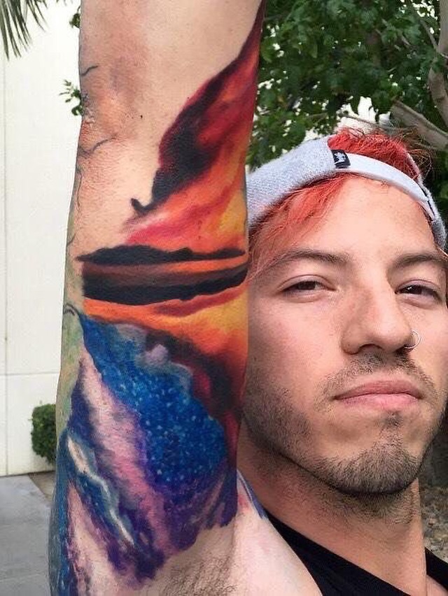 Josh Dun colorful arm tattoo close-up