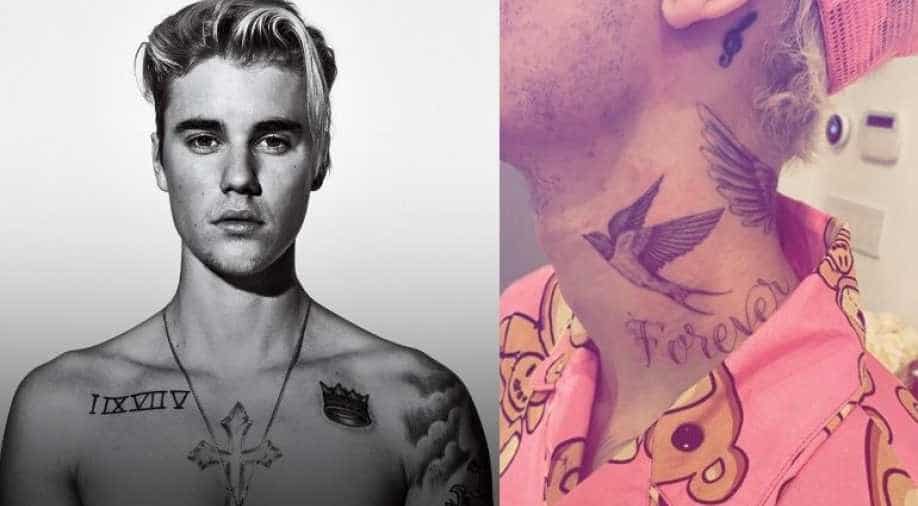 Justin Bieber’s neck bird and chest tattoos