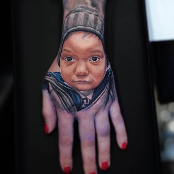 JWoww son portrait hand tattoo