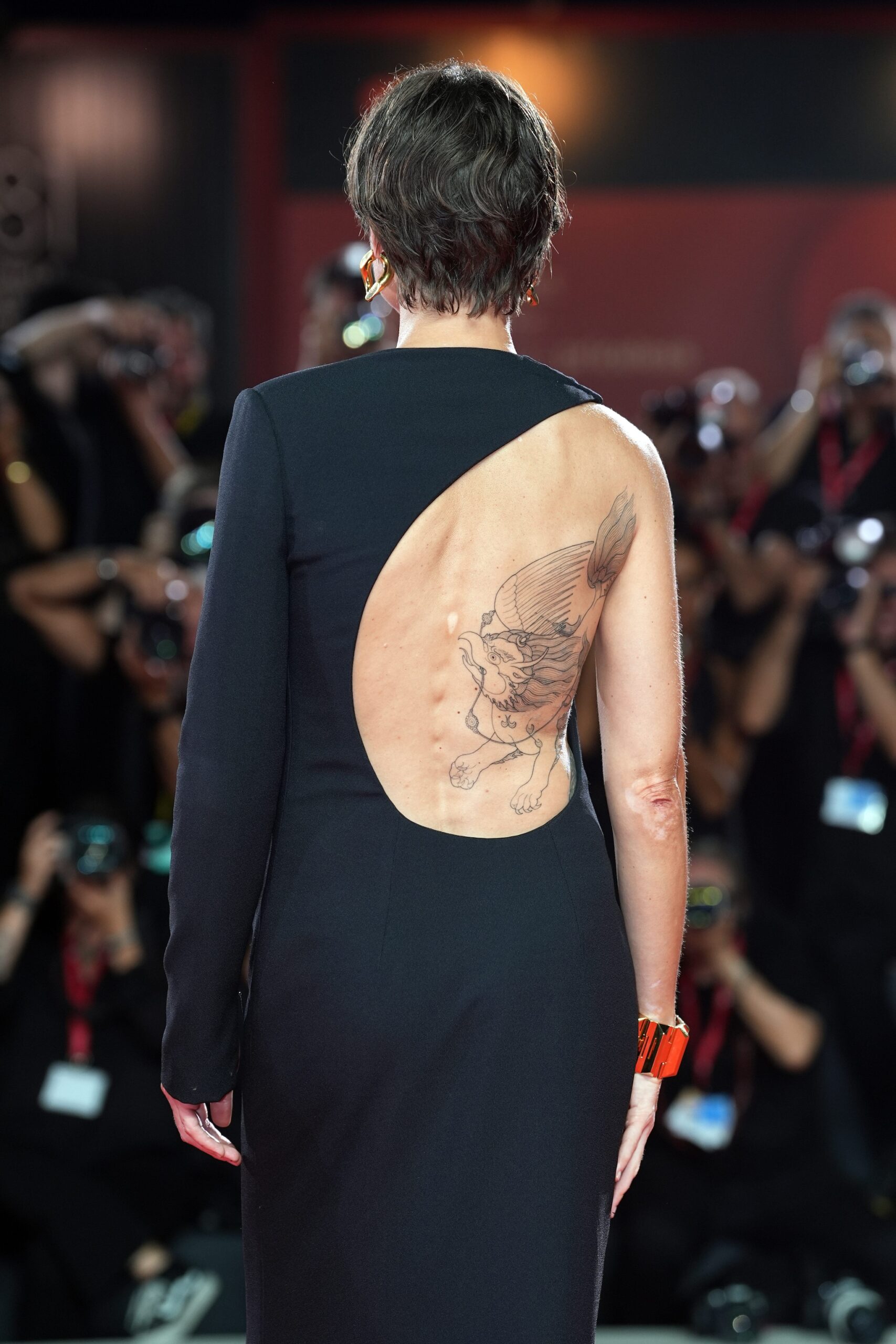 Kasia Smutniak Pixiu back tattoo at Venice Film Festival