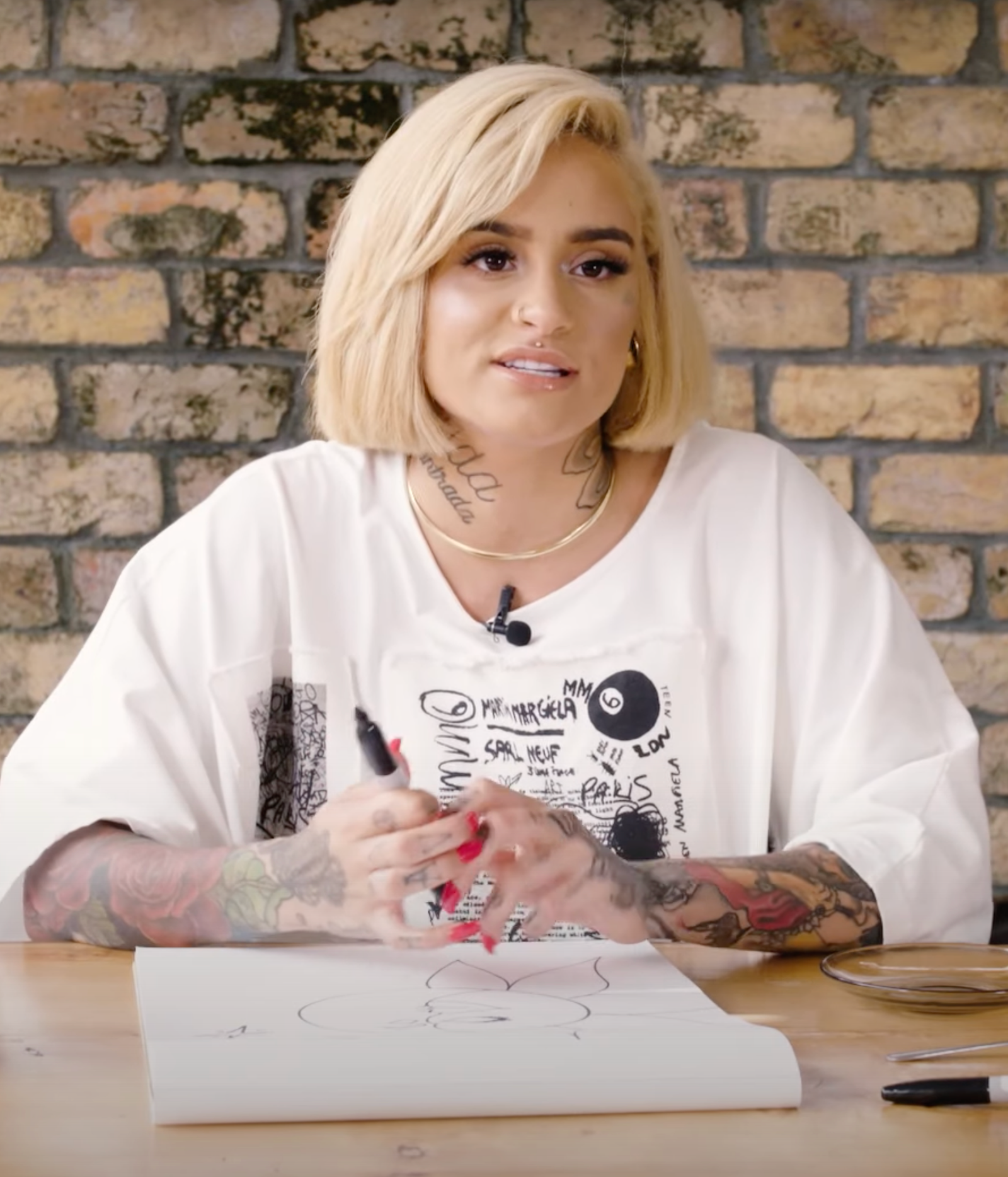 Kehlani showing her face tattoos