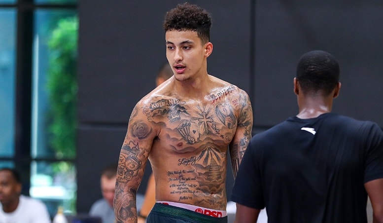 Kyle Kuzma sacred heart and dove chest tattoos at Lakers practice