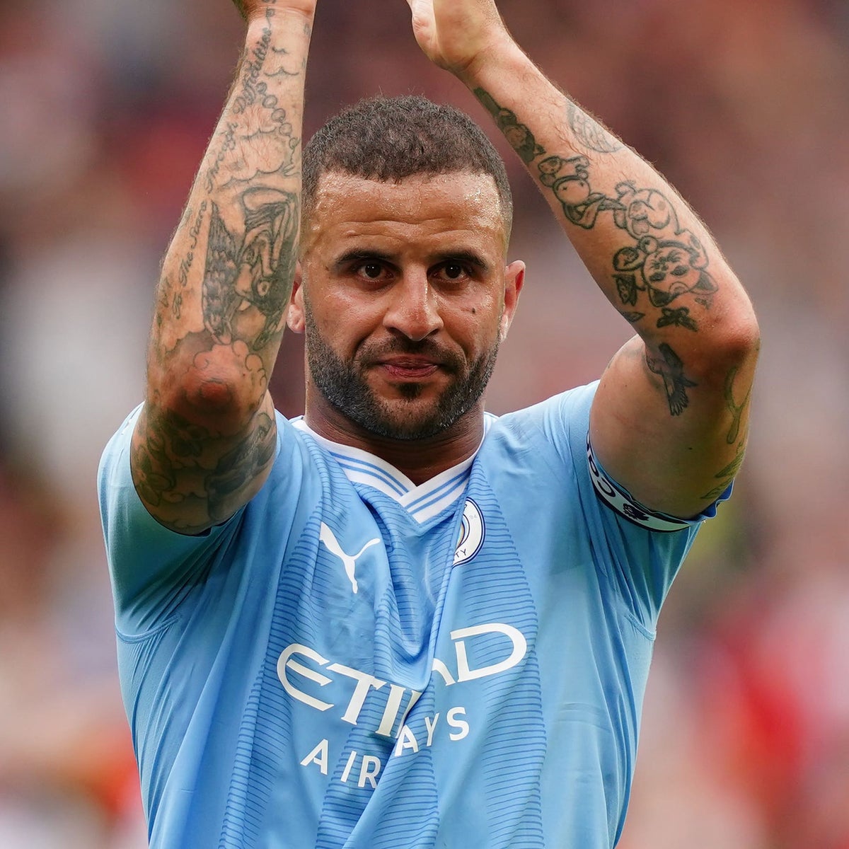 Kyle Walker arm tattoos including his grandfather eye tribute