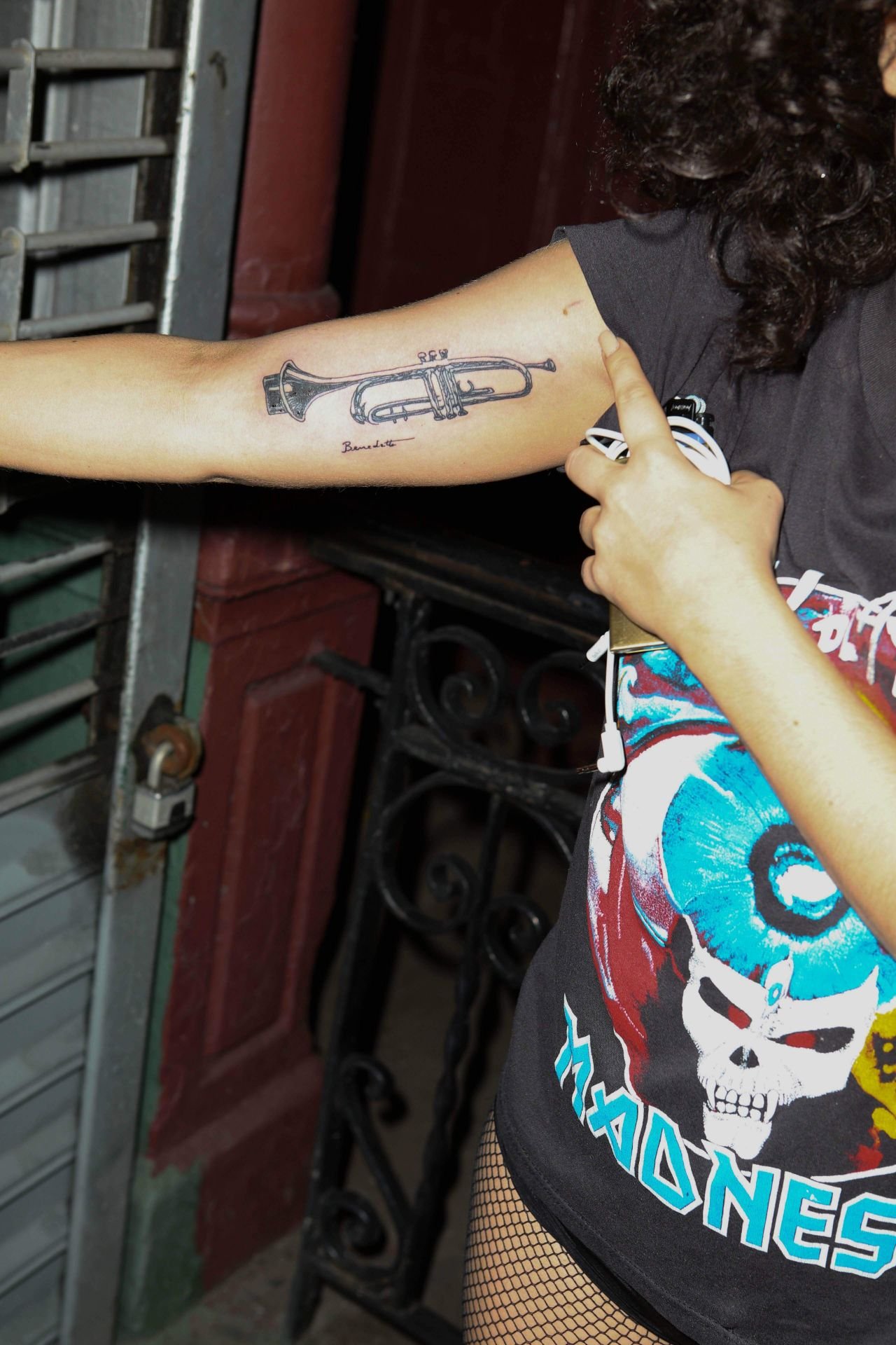 Lady Gaga's Benedetto trumpet tattoo on her inner arm