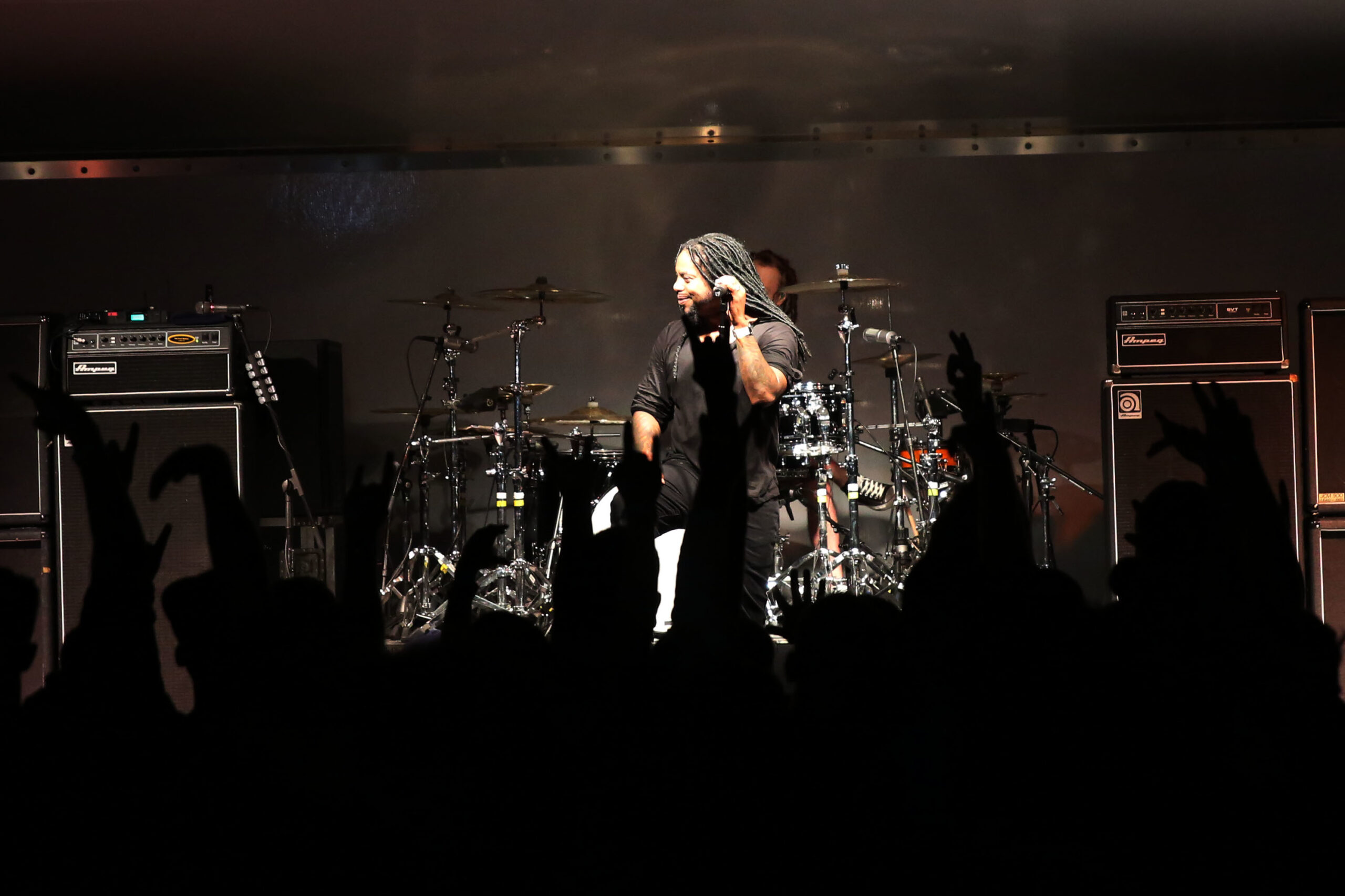 Lajon Witherspoon tattooed arms on stage