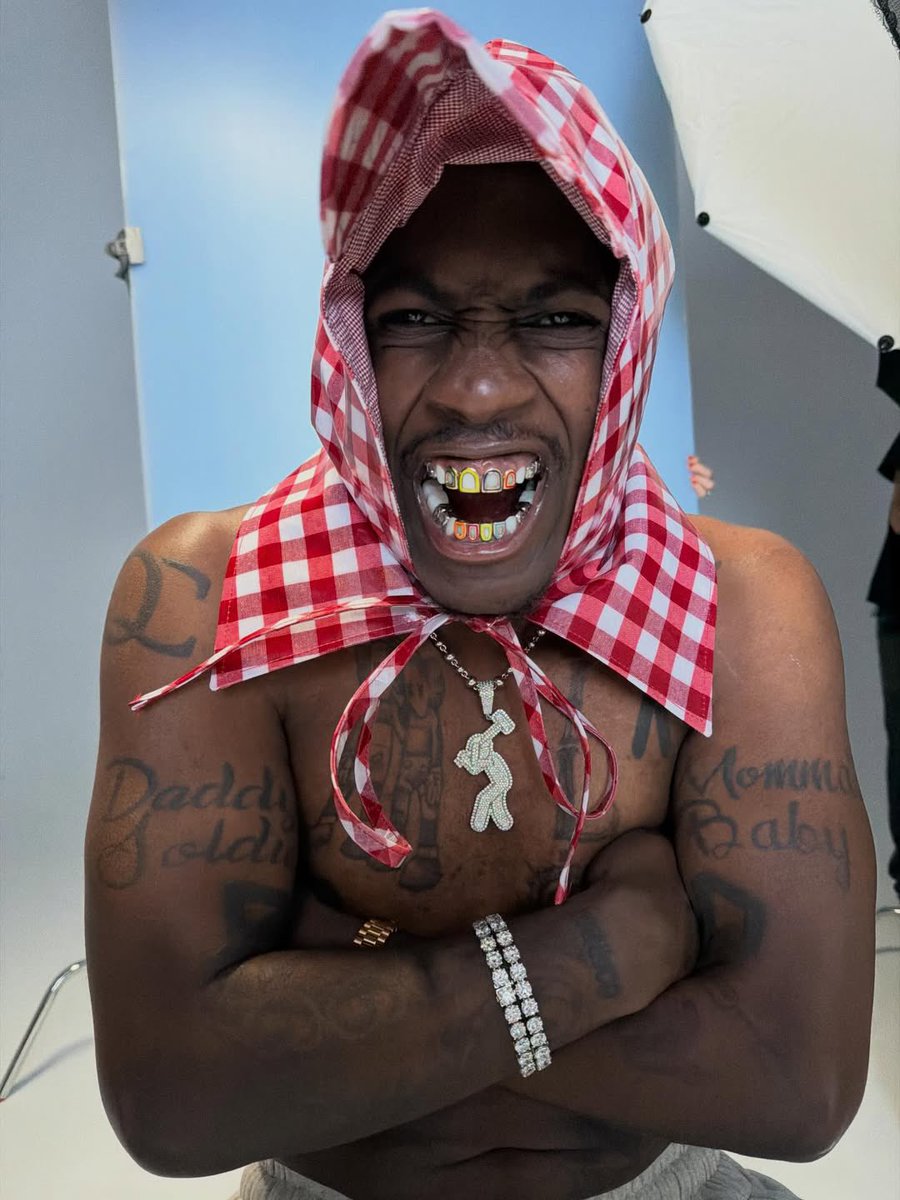 Lil Yachty Mommy Baby and Daddy Soldier arm tattoos