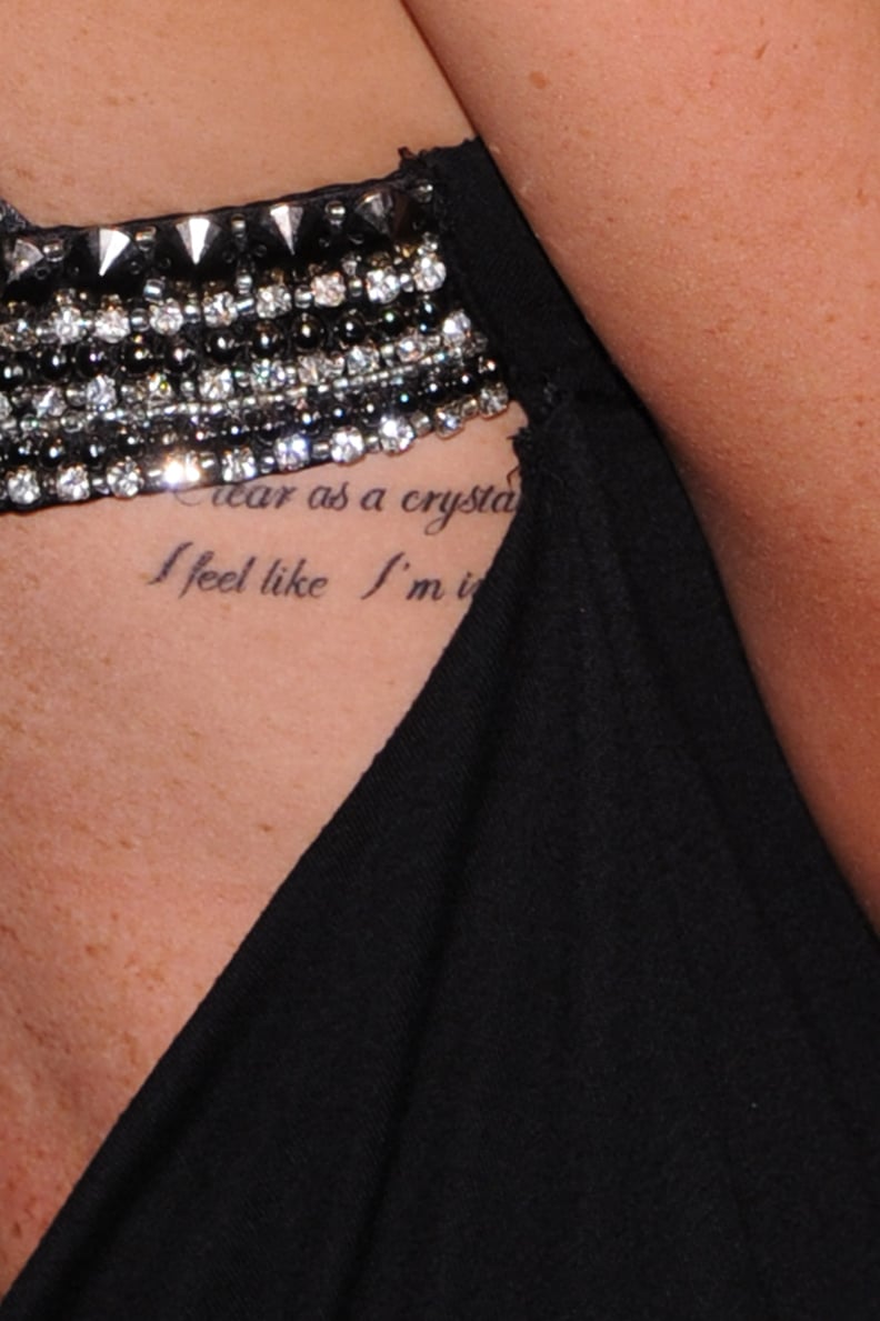 Lindsay Lohan rib cage lyric tattoo