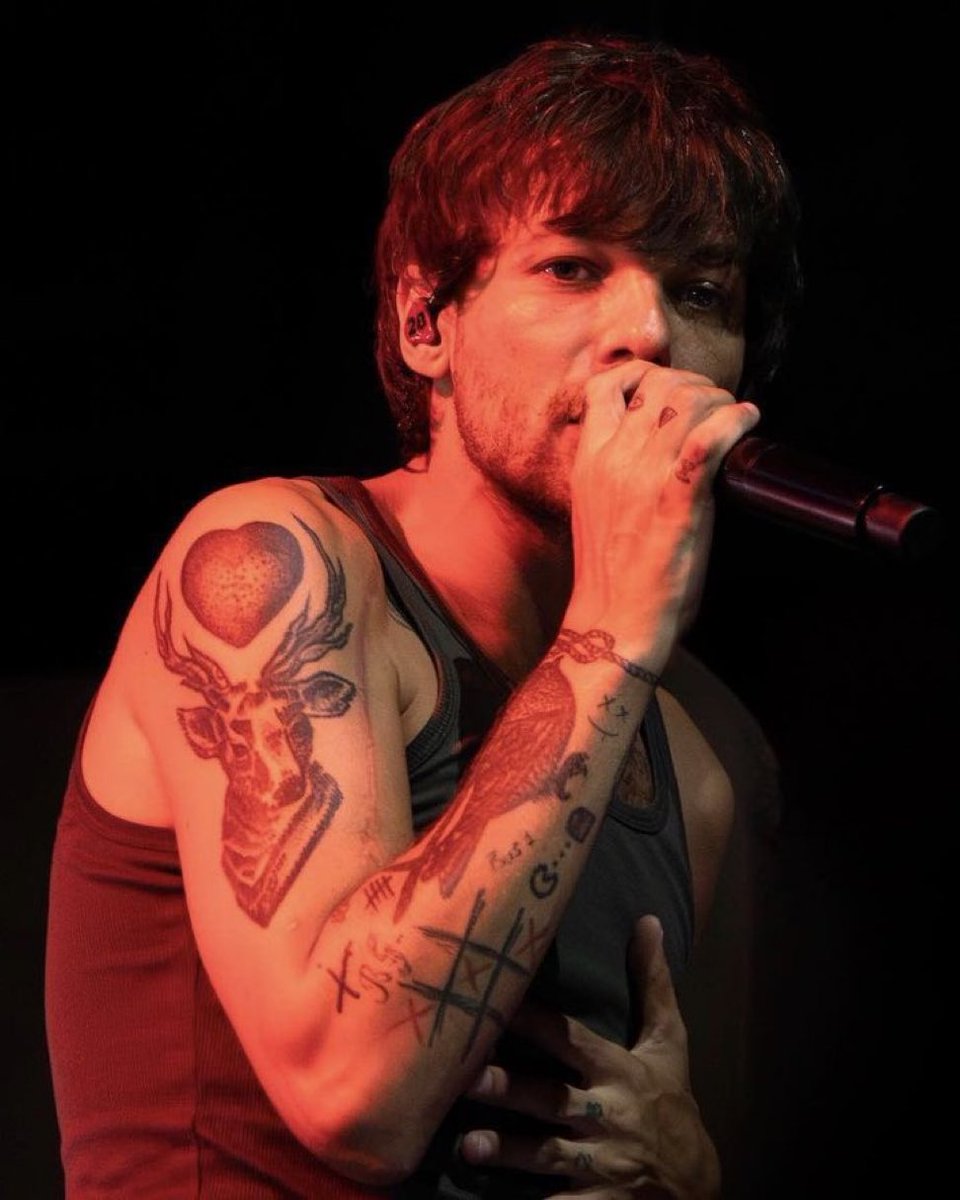 Louis Tomlinson stag heart tattoo