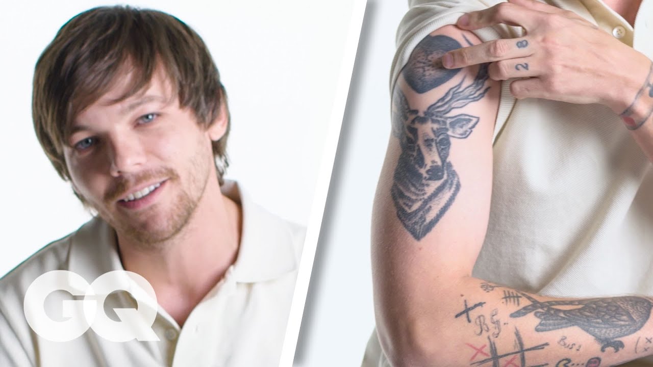 Louis Tomlinson GQ tattoo tour showing his arm tattoos