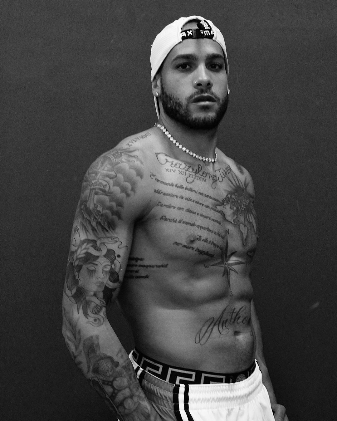 Marcell Jacobs compass tattoo
