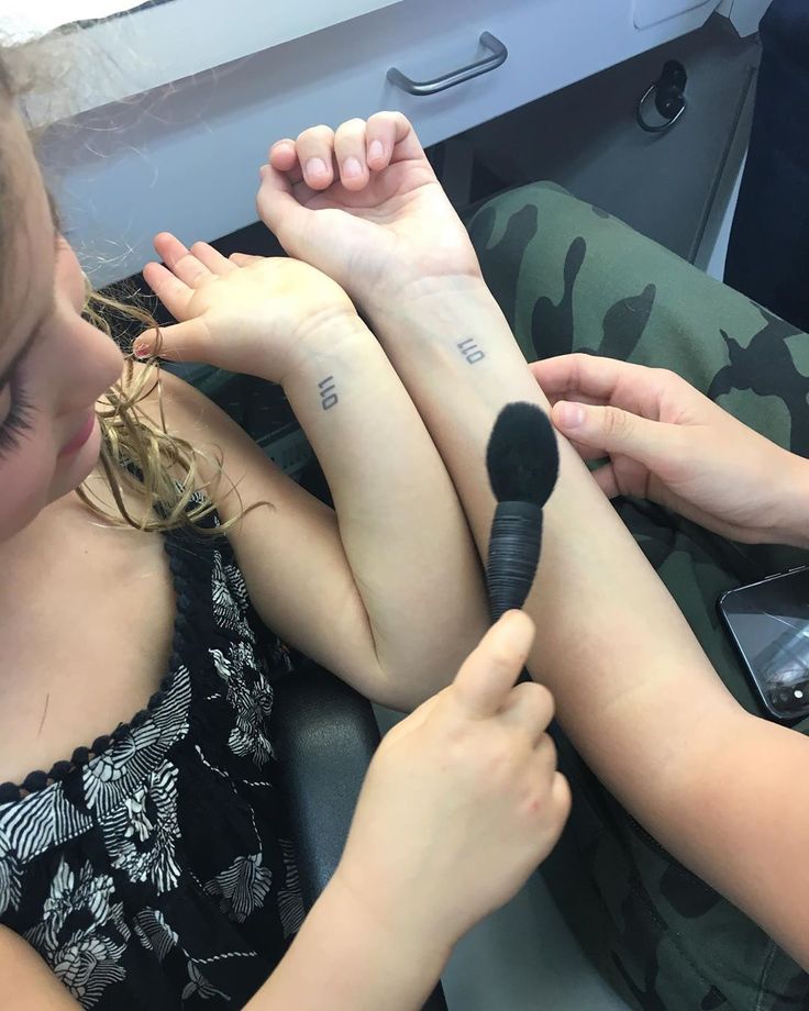 Millie Bobby Brown and Esme matching 011 wrist tattoos