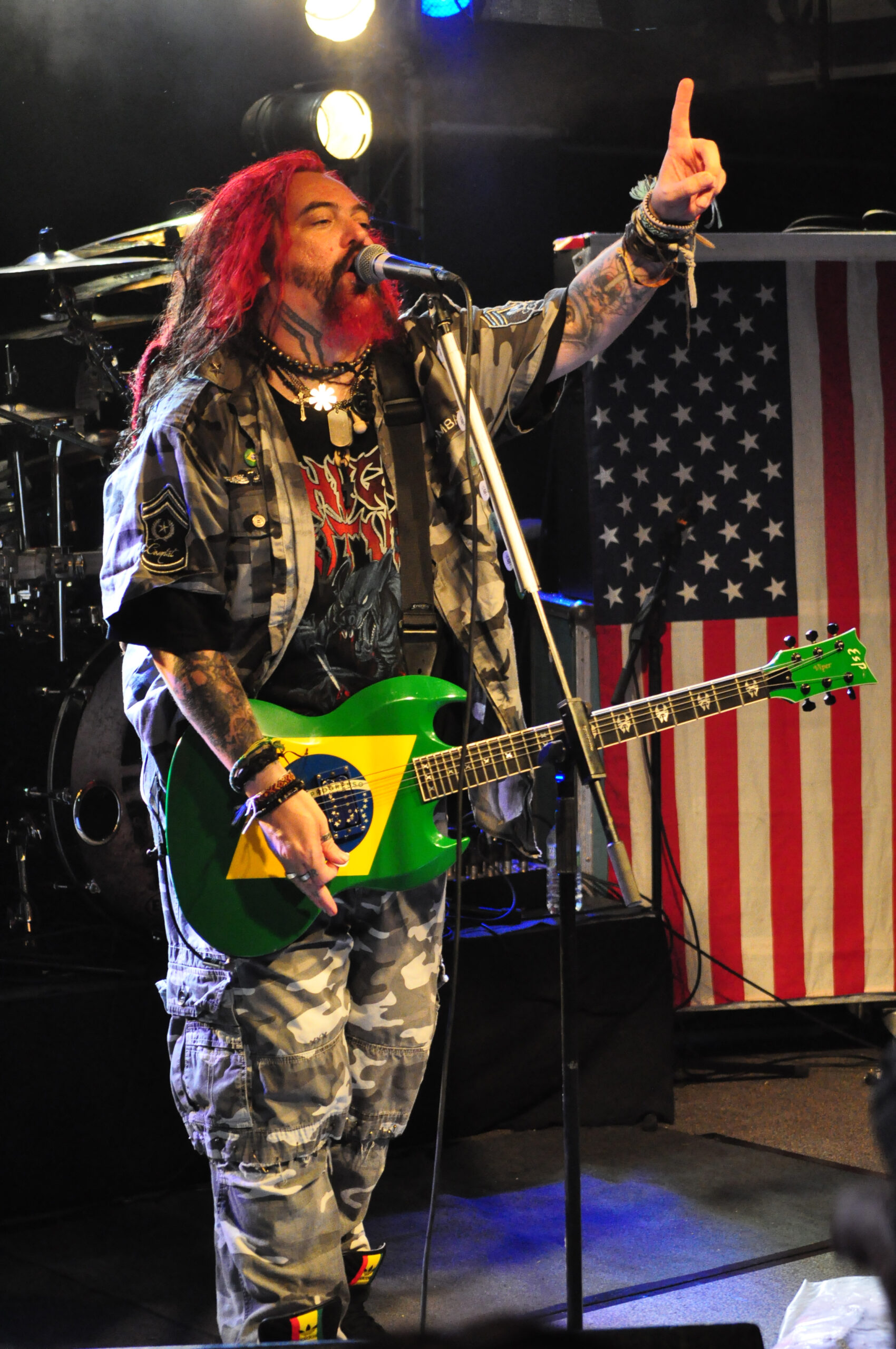 Max Cavalera forearm tattoos on stage