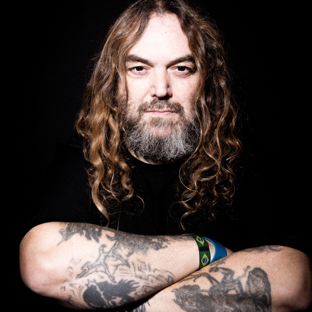 Max Cavalera tattooed arms close-up