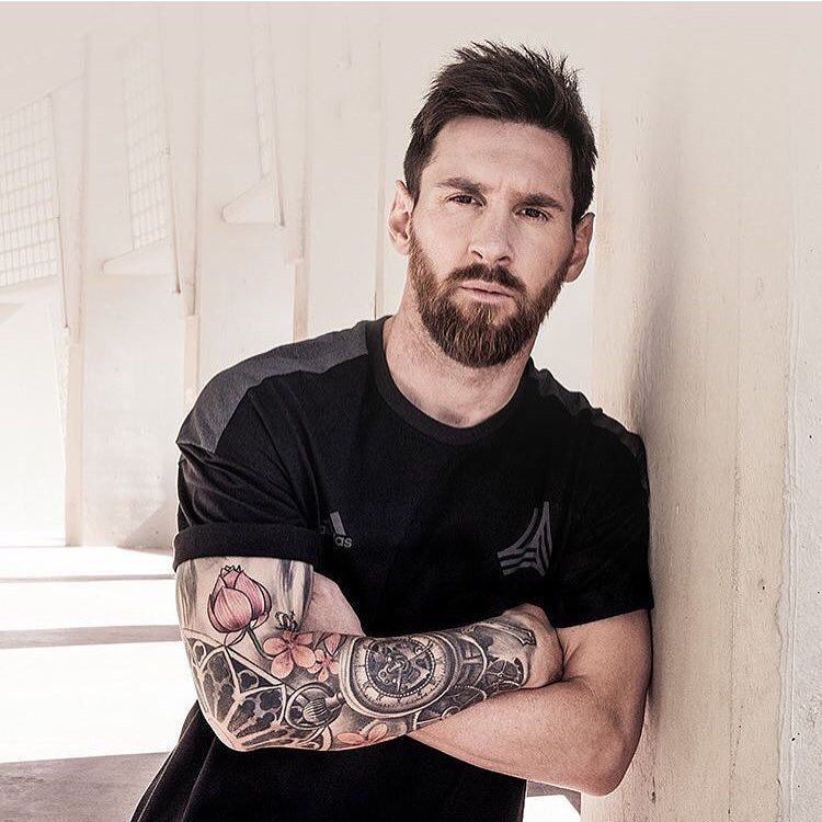 Lionel Messi tattooed arm portrait