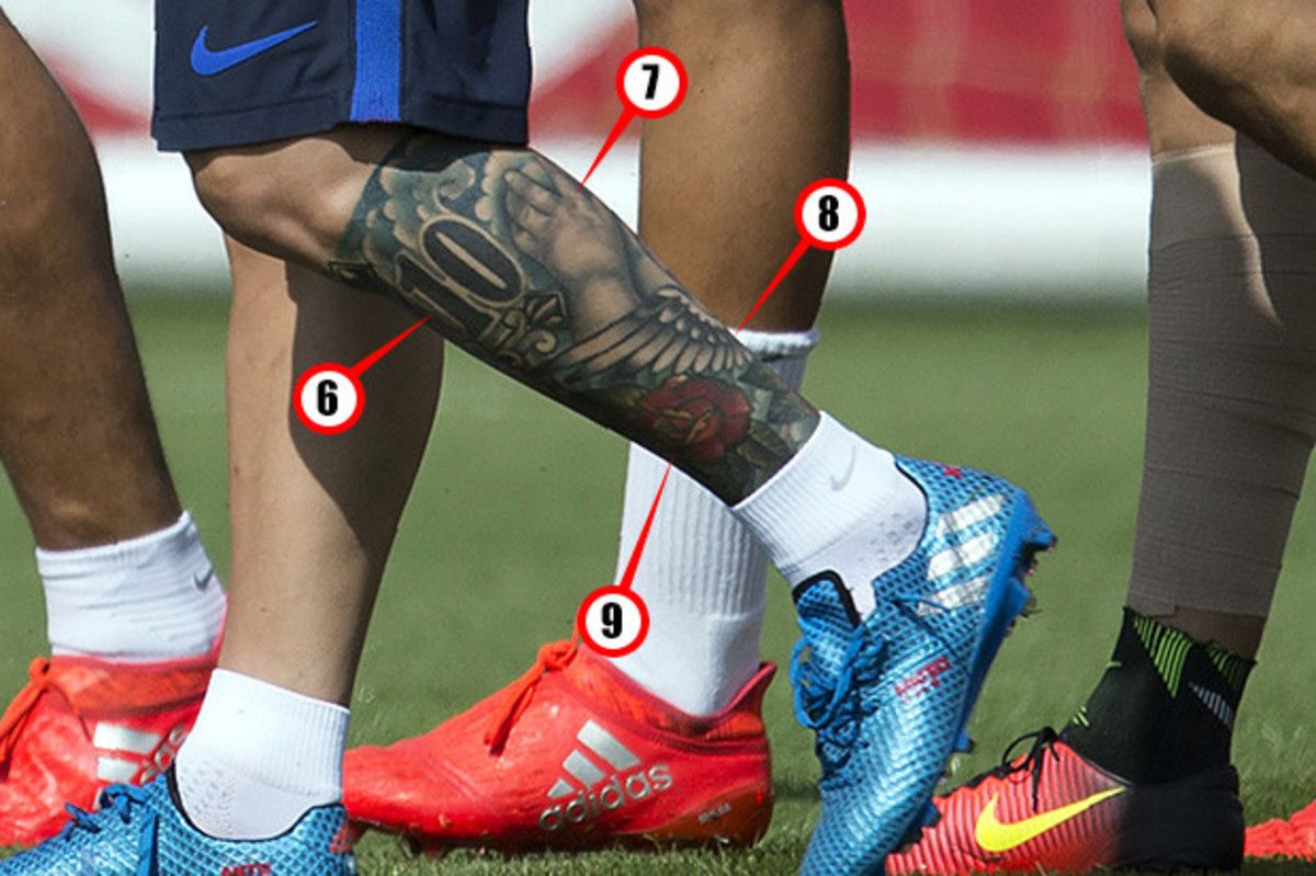 Lionel Messi football and leg tattoos