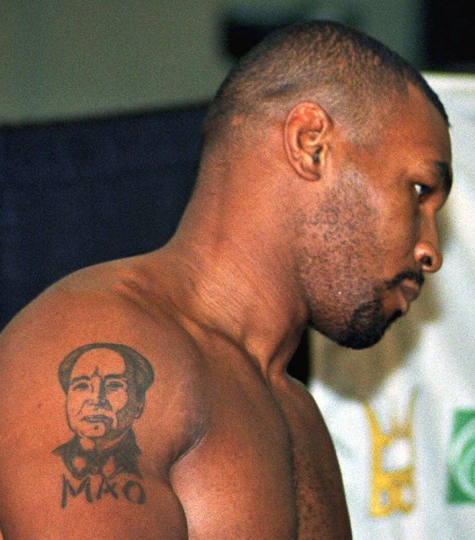 Mao Zedong portrait and MAO lettering on Mike Tyson’s upper-arm tattoo