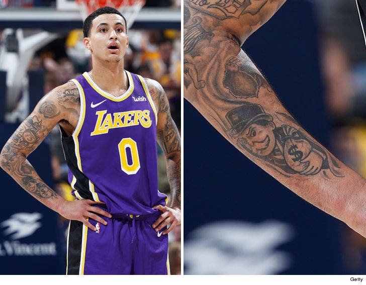 Kyle Kuzma Monopoly man tattoo on his forearm