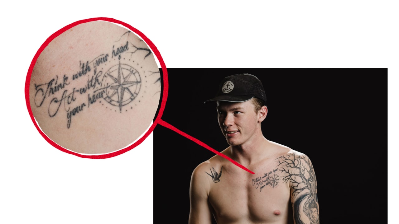 Morgan Geekie chest tattoo reading Think with your head act with your heart