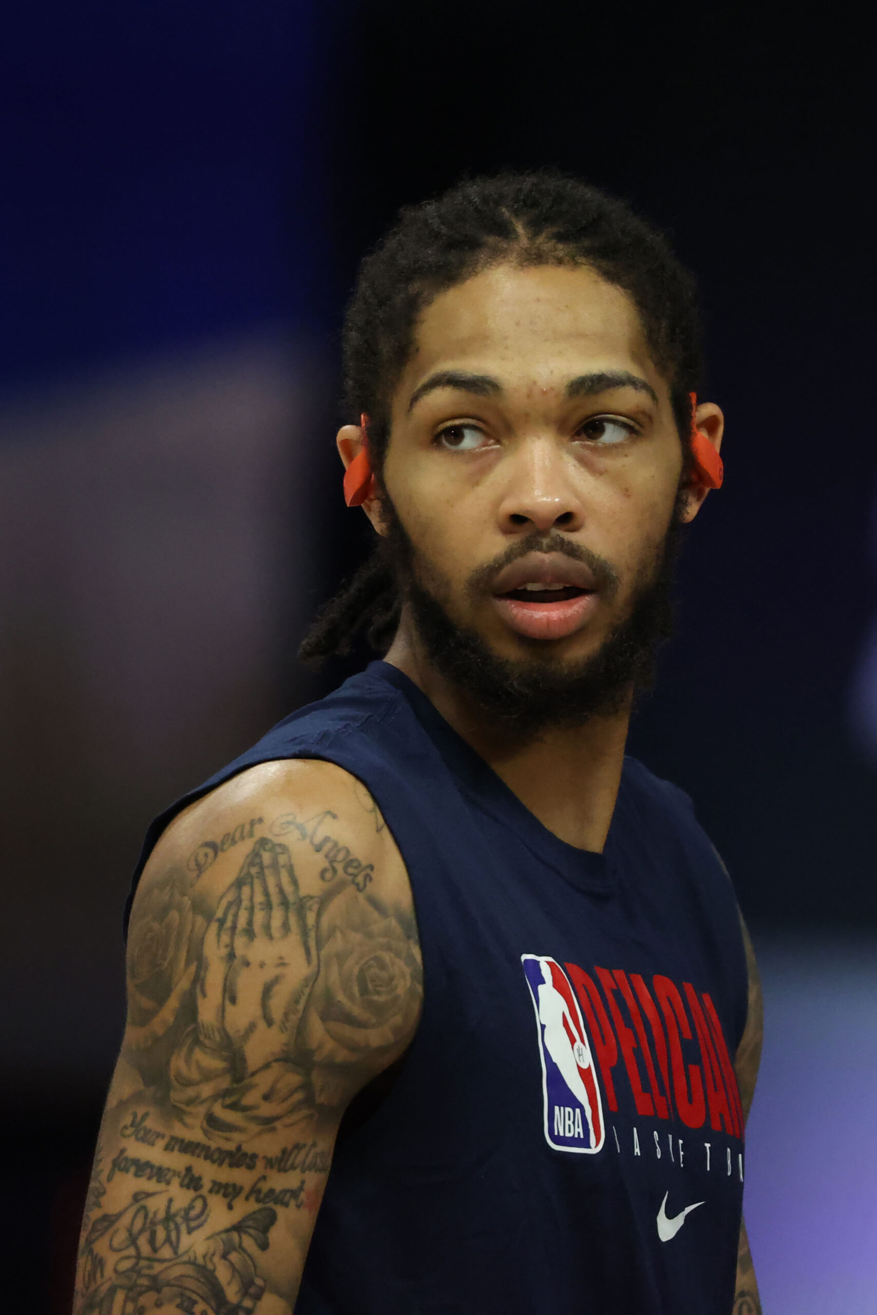 Brandon Ingram tattooed shoulder and arm in a basketball portrait