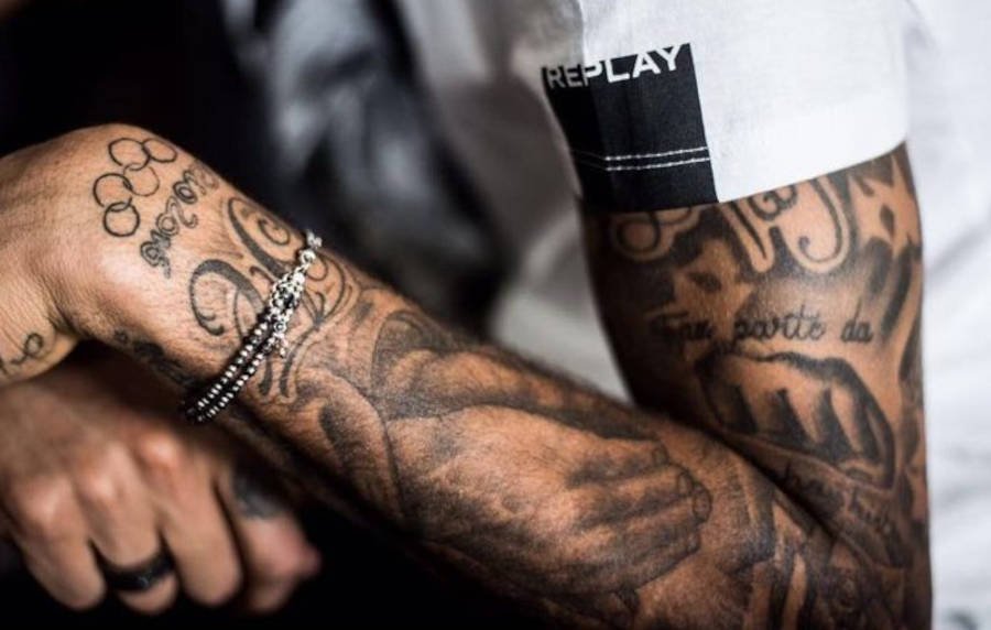 Neymar arm and hand tattoos in a close detail photograph